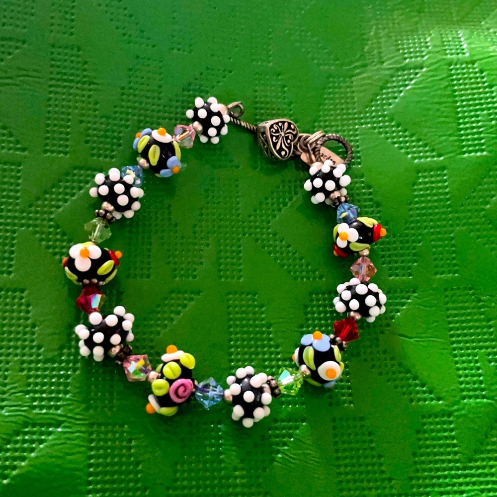 Fun multi colored hand blown glass beaded bracelet.